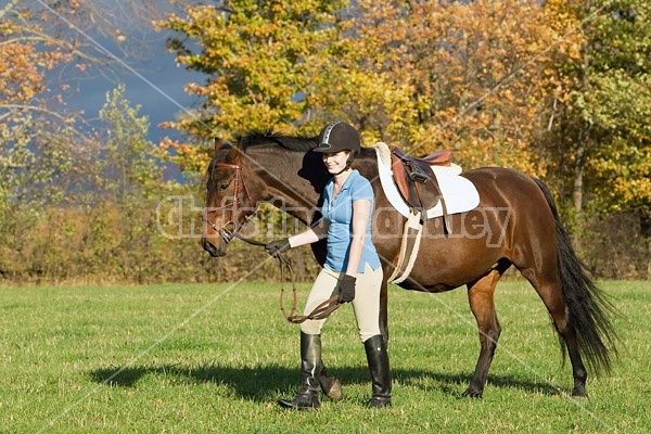 Young woman and her horse