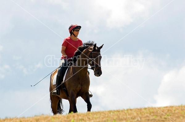 Woman horseback riding