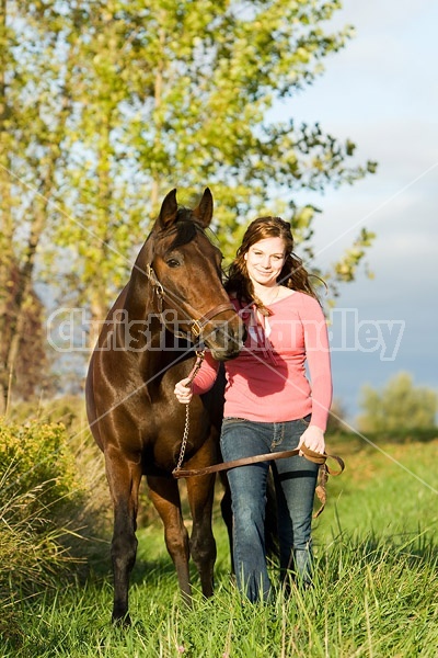 Young woman and her horse