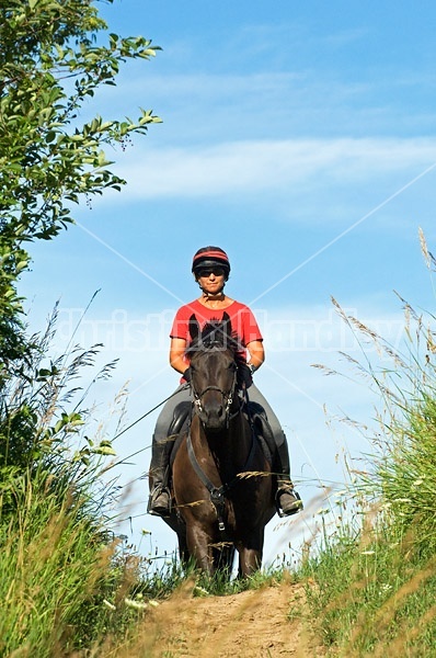 Woman horseback riding