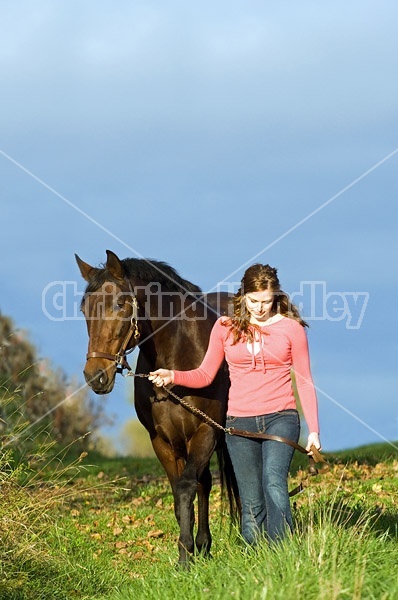 Young woman and her horse