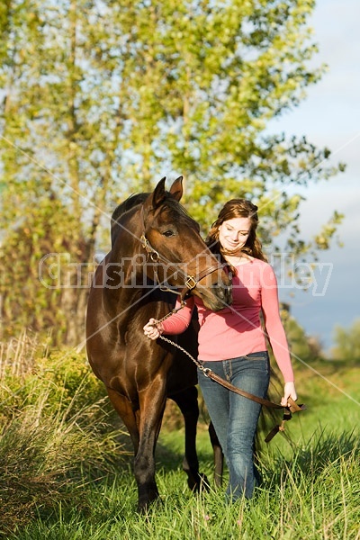 Young woman and her horse