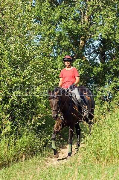 Woman horseback riding