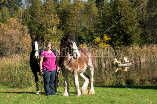 Portrait of a woman and her two horses