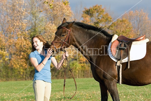 Young woman and her horse