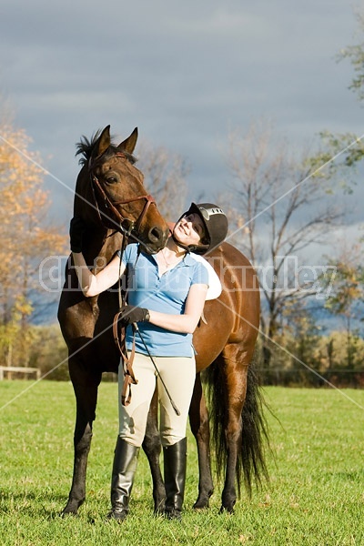 Young woman and her horse