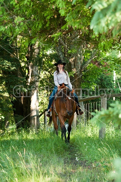 Young woman trail riding in Ontario Canada